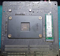 Back of the board with Noctua plate and NVMe SSD
