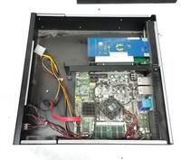 Internals: Mini-ITX board, and PCI cards on a riser