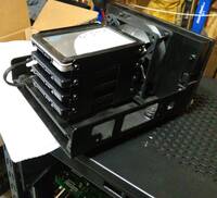 Some SSDs in a 5.25" to quad 2.5" bay adapter