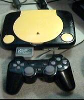 playstation one painted black and yellow